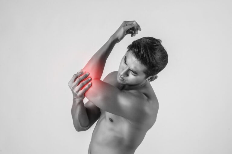 portrait-muscle-man-having-elbow-pain-isolated-white-background (1)